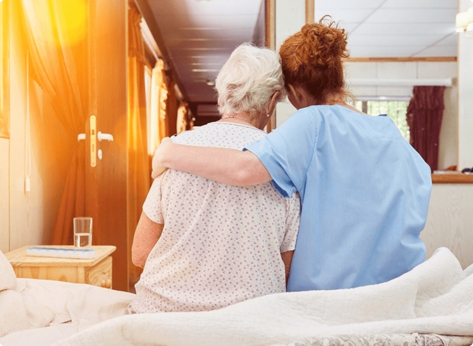 Caregiver assisting elderly person